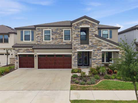 Photo of 12970 Steed Trace Loop, Lithia, FL 33547 (MLS # TB8527699)