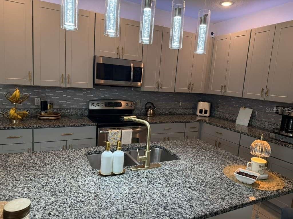 Photo of 570 Feltrim Manor Road, Haines City, FL 33844 (MLS # O6400486)