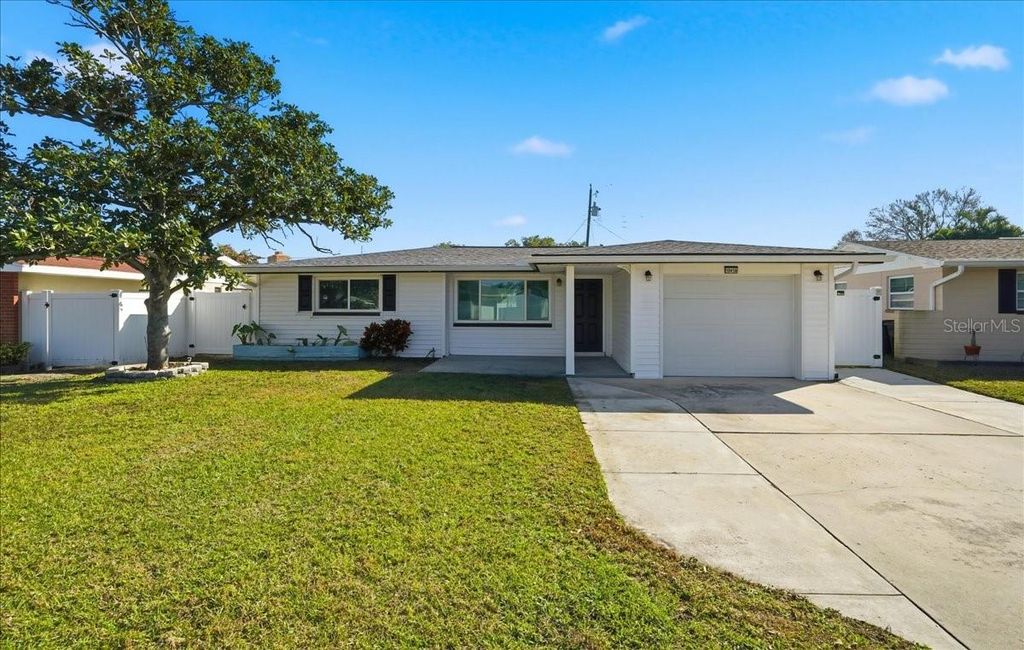 Photo of 10416 Orange Blossom Lane, Seminole, FL 33772 (MLS # TB8462199)