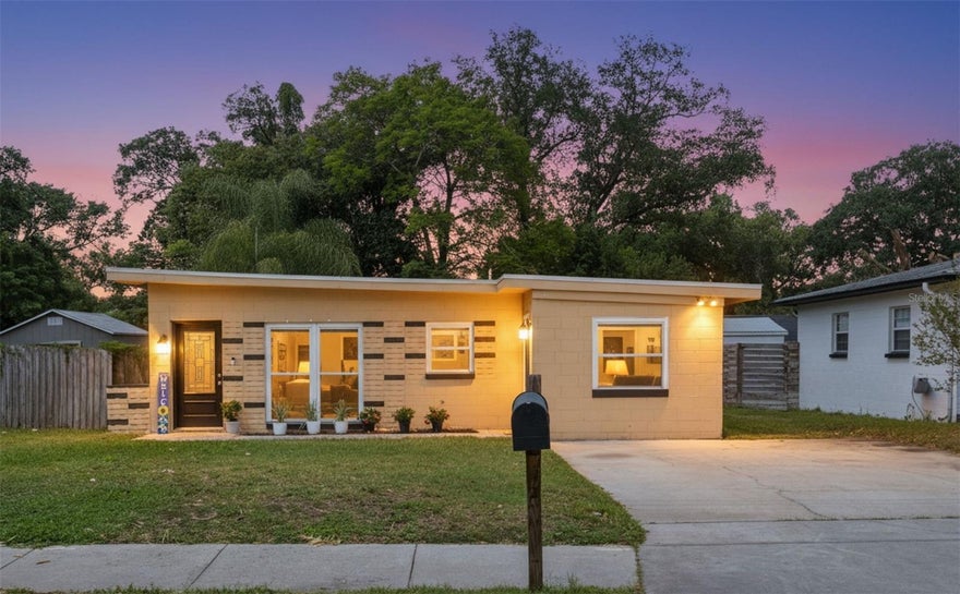Welcome to this beautifully renovated mid-century inspired residence in the Fernway Community minutes from Downtown Orlando! Ideally situated just off Bumby Avenue, this home offers unbeatable convenience—just minutes from the 408 Expressway and I-4 interchange, and only 15 minutes to Orlando International Airport. 

Completely rebuilt from the studs in, this home is essentially brand new from the exterior walls inward. Every detail has been thoughtfully upgraded, blending modern style with peace-of-mind improvements.

Step inside to discover stunning luxury vinyl plank flooring throughout, complemented by fresh interior and exterior paint. The open and inviting layout features a fully remodeled bathroom and a versatile third bedroom that can easily serve as a home office or den.

The kitchen shines with newer stainless steel appliances, while newer windows and sliding glass doors fill the home with natural light. Additional upgrades include:
 • New energy-efficient split AC system
 • Upgraded plumbing throughout
 • Upgraded 200-amp electrical service
 • Tankless water heater for endless hot water
 • New fiberglass entry doors withlead glass inserts

Outside, enjoy a freshly installed lawn with a Rain Bird irrigation system, essential for maintaining lush Florida landscaping year-round. A large unfinished shed in the backyard offers endless potential—create a workshop, studio, or your own private retreat.

Location is everything, and this home delivers:
 • Minutes to downtown Orlando dining, entertainment, and nightlife
 • Easy access to I-4 and 408, and Orlando International Airport for commuting
 • Close to major hospitals, shopping, Target, and Publix
 • Walking distance (approx. 4 blocks) to Pershing K-8
 • Zoned for Boone High School (Go Braves!)
 • Steps from Fort Gatlin Recreation Complex featuring a pool, tennis courts, and expansive park

No HOA and priced to sell, this is an incredible opportunity to own a completely renovated home in one of Orlando’s most desirable and convenient locations.