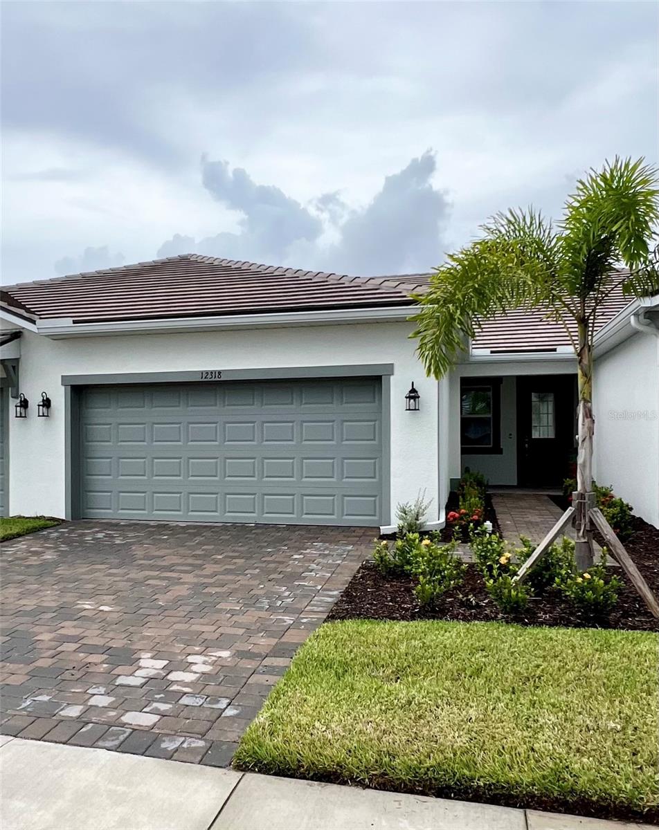 Welcome to this beautifully crafted, newly built villa offering 2 spacious bedrooms, 2 full bathrooms, and a flexible den—perfect for a home office, guest room, or creative space. This unit comes full furnished. Enjoy tranquil pond views from both the screened lanai and the primary bedroom, creating a peaceful ambiance throughout the home.
The open-concept layout features a gourmet kitchen with brand-new appliances, seamlessly flowing into a spacious great room ideal for entertaining or relaxing. A dedicated laundry room, contemporary finishes, and thoughtful design elements enhance both comfort and functionality.
Located in the heart of Wellen Park, this villa is part of a vibrant community offering resort-style amenities, including: Clubhouse, Resort-style pool, Fitness center, Pickle ball courts, and so much more.
This home combines modern living with natural beauty and active lifestyle options, making it the perfect retreat for those seeking comfort, convenience, and community.