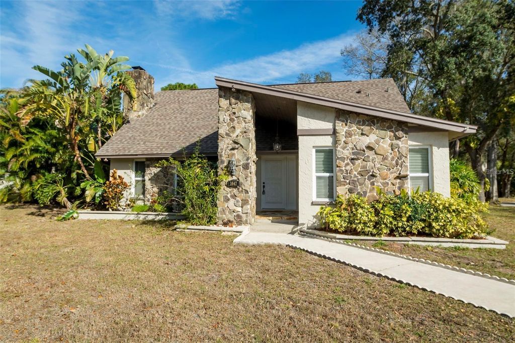 Photo of 1647 Hobbit Road, Dunedin, FL 34698 (MLS # TB8485857)
