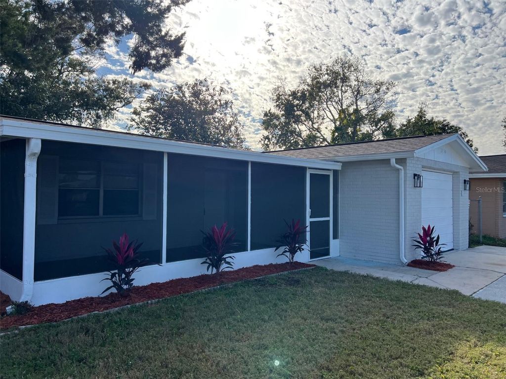 Photo of 3800 Darlington Road, Holiday, FL 34691 (MLS # TB8431207)