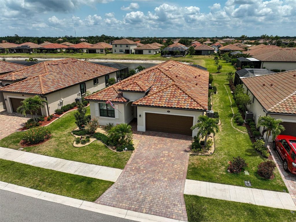 Photo of 20542 Trattoria Loop, Venice, FL 34293 (MLS # A4651861)