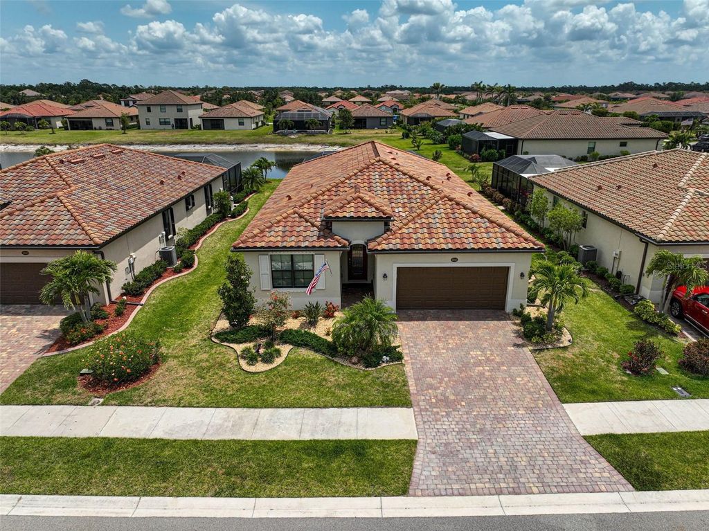 Photo of 20542 Trattoria Loop, Venice, FL 34293 (MLS # A4651861)