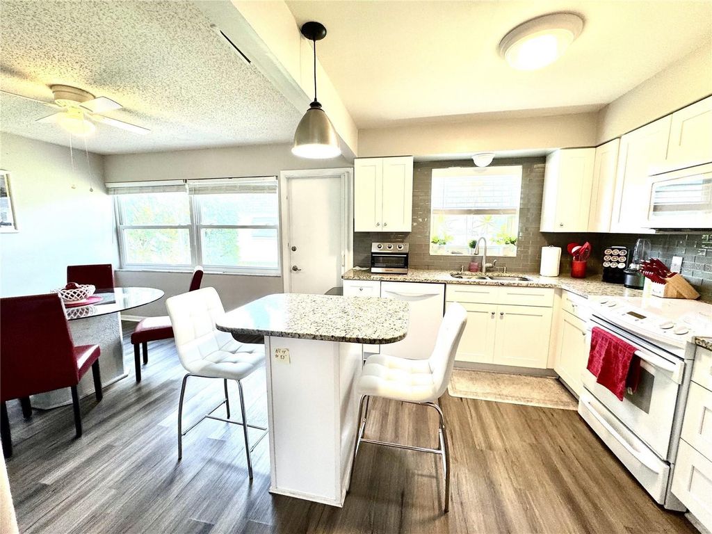 Photo of 6997 Versailles N #n/a, Pinellas Park, FL 33781 (MLS # TB8502898)