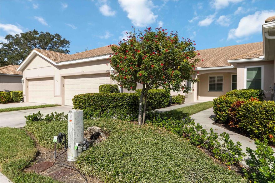 Welcome to 4209 Cascade Falls Drive, a beautifully maintained villa in the highly desirable 55+ community of LakeRidge Falls in Sarasota. This inviting 2-bedroom plus den, 2-bath home offers a spacious, flexible layout ideal for work, hobbies, or overnight guests. Warm hardwood flooring enhances the main living areas, while the gourmet kitchen—complete with a gas range and abundant cabinetry—creates a perfect space for cooking and entertaining. The great room opens to peaceful lake views, providing a serene backdrop for everyday living. A 2-car garage offers convenience and additional storage.

LakeRidge Falls is celebrated for its active lifestyle and newly renovated amenities. The clubhouse features an expanded grand salon for gatherings, a modern fitness center, and an updated community kitchen with a pass-through window designed for social events. The pool annex offers two billiards tables, a library, computer stations with free Wi-Fi, and comfortable lounge areas. Outdoor amenities include a heated resort-style pool, spa, two bocce courts, and a tranquil lakeside beach. Residents enjoy a full calendar of activities, from mahjong and poker to yoga, stretch classes, table tennis, water aerobics, bingo, and more.

The location is exceptional. LakeRidge Falls is within walking distance to restaurants, cafés, grocery stores, banks, fitness studios, and a movie theater. Sarasota’s award-winning beaches—including Siesta Key and Lido Key—are just 15 minutes away, along with premier cultural destinations like the Ringling Museum, Van Wezel Performing Arts Hall, Selby Botanical Gardens, Asolo Theatre, and Mote Marine Aquarium. The UTC Mall, Whole Foods, and downtown Sarasota are also close by.

Offering lifestyle, comfort, and convenience, this 2-bedroom plus den villa is the perfect opportunity to enjoy effortless living in one of Sarasota’s most sought-after communities. Schedule your private showing today.