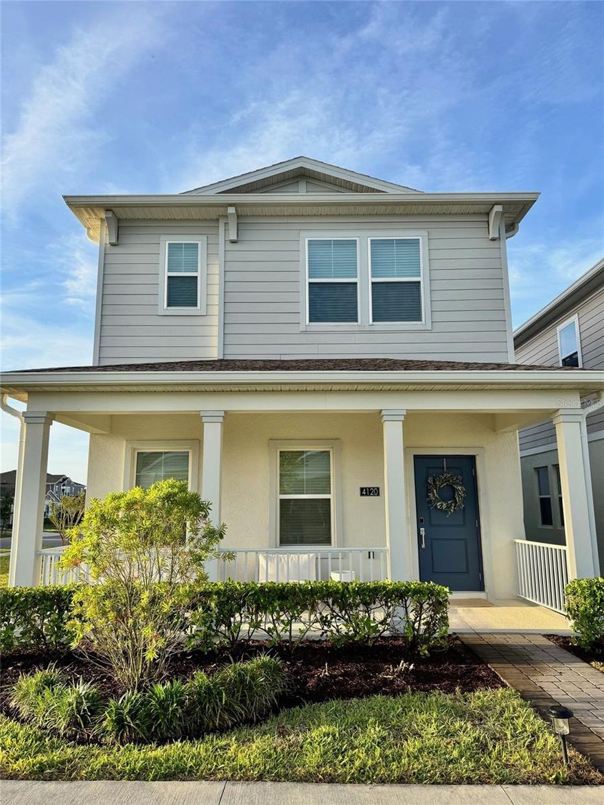 Welcome to Golden Orchard, where newer construction, community amenities, and polished design come together in one of Apopka’s most desirable north-corridor neighborhoods. This former model home offers 3 bedrooms, 2.5 baths, and an open-concept layout designed for everyday living and easy entertaining. The main level features expansive tile flooring, a bright designer kitchen with white counters, stainless steel appliances, stylish pendant lighting, and a large island that opens seamlessly to the dining and living spaces. From the covered front porch to the warm neutral finishes throughout, the home feels clean, current, and truly move-in ready.

Upstairs, the spacious primary suite is complemented by modern baths, generous natural light, and excellent storage, including a beautifully built-out walk-in closet. Every room shows thoughtful care, and the overall presentation reads far above typical builder-basic resale inventory. Located in Golden Orchard’s solar-powered master-planned setting, residents enjoy access to community amenities and convenient proximity to Wekiwa Springs State Park, Rock Springs, and Mount Dora, with easy access to major commuter routes throughout Florida.