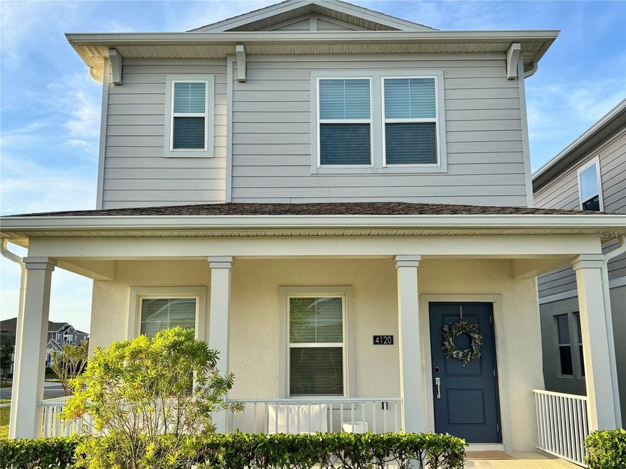 Welcome to Golden Orchard, where newer construction, community amenities, and polished design come together in one of Apopka’s most desirable north-corridor neighborhoods. This former model home offers 3 bedrooms, 2.5 baths, and an open-concept layout designed for everyday living and easy entertaining. The main level features expansive tile flooring, a bright designer kitchen with white counters, stainless steel appliances, stylish pendant lighting, and a large island that opens seamlessly to the dining and living spaces. From the covered front porch to the warm neutral finishes throughout, the home feels clean, current, and truly move-in ready.

Upstairs, the spacious primary suite is complemented by modern baths, generous natural light, and excellent storage, including a beautifully built-out walk-in closet. Every room shows thoughtful care, and the overall presentation reads far above typical builder-basic resale inventory. Located in Golden Orchard’s solar-powered master-planned setting, residents enjoy access to community amenities and convenient proximity to Wekiwa Springs State Park, Rock Springs, and Mount Dora, with easy access to major commuter routes throughout Florida.