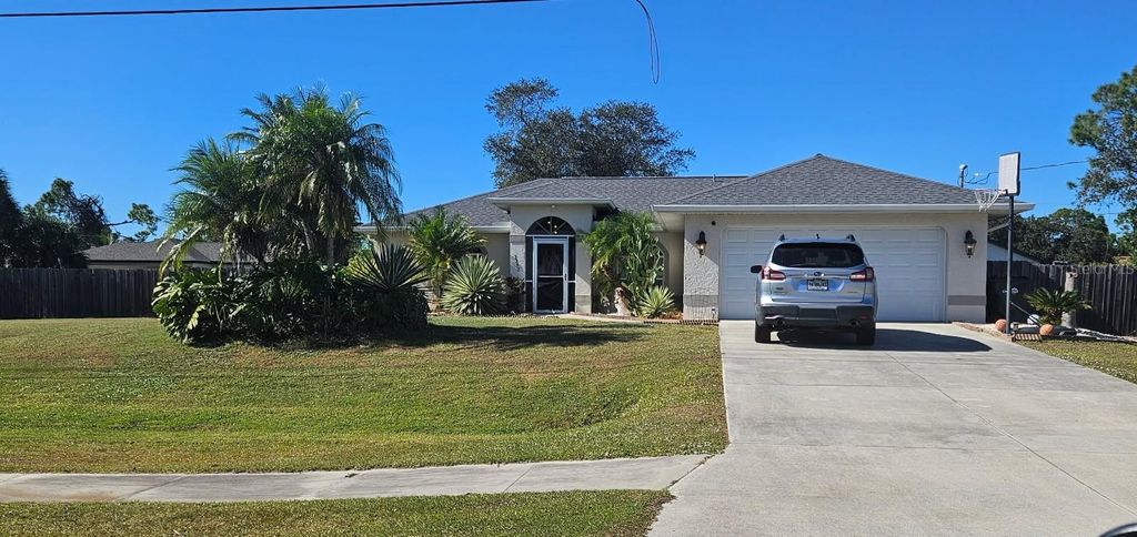 Photo of 3357 N Chamberlain Boulevard, North Port, FL 34286 (MLS # A4672182)