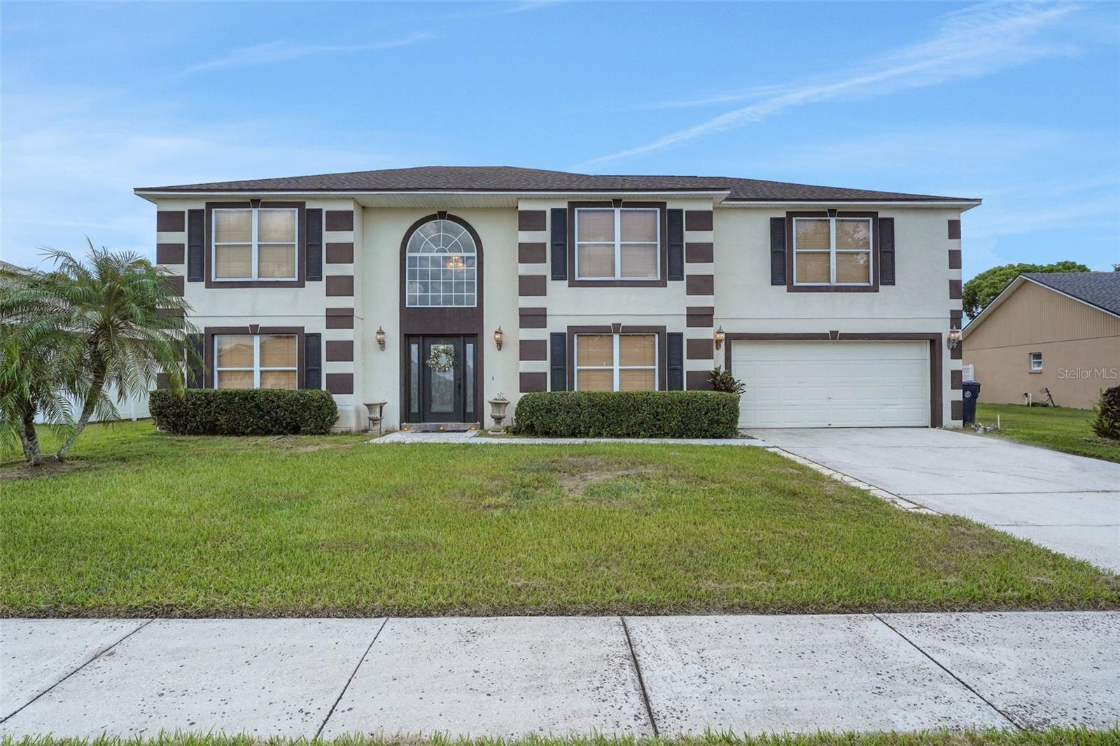 Welcome to 114 Shaddock Drive, a beautifully maintained and spacious two-story home located in the heart of Auburndale within the secure gates of Shaddock Estates. Offering 5 bedrooms plus a dedicated office or 1st floor bedroom, and an open loft, this residence delivers over 2,900 square feet of thoughtfully designed living space with flexibility for growing households or multi-use living. A new roof and newer Carrier AC systems (one for each floor) bring peace of mind and energy efficiency.
Inside, you’ll be greeted by a large formal entryway that opens to a front living room and formal dining room. The kitchen has been tastefully updated with newer granite countertops, wood cabinetry, a center island, and a beautiful tile backsplash—all connected to a breakfast nook and overlooking the backyard. The spacious dining or family room sits at the rear of the home, offering a great gathering space with room to relax and entertain.
Upstairs, you'll find four generously sized guest bedrooms, a full bathroom, and a loft-style second living area, perfect for a media room, playroom, or additional office. The primary suite includes two walk-in closets and a spacious en-suite bath with dual vanities, soaking tub, and separate shower.
The home features laminate flooring throughout the main living areas, ceramic tile in the bathrooms, and cozy carpet in the bedrooms. The backyard offers a large paver patio with space to entertain and enjoy the outdoors. With curb appeal, space to grow, and a location just minutes from downtown Auburndale, Lake Ariana, and major highways, this home checks every box.