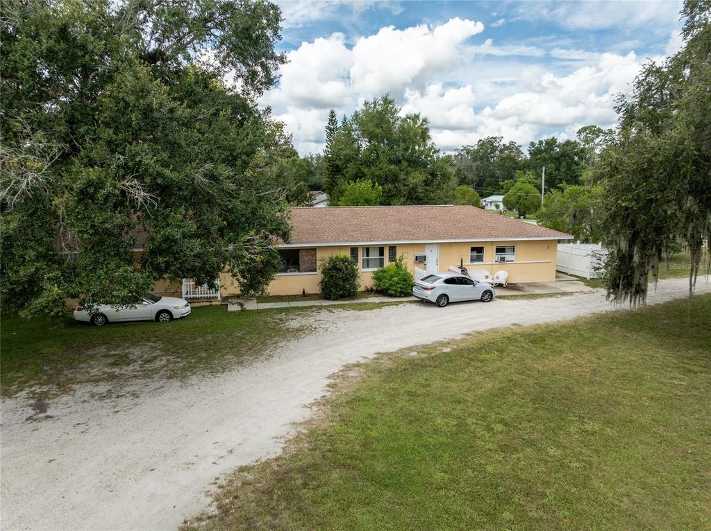 Photo of 124 S Charles Richard Beall Boulevard, Debary, FL 32713 (MLS # V4945101)
