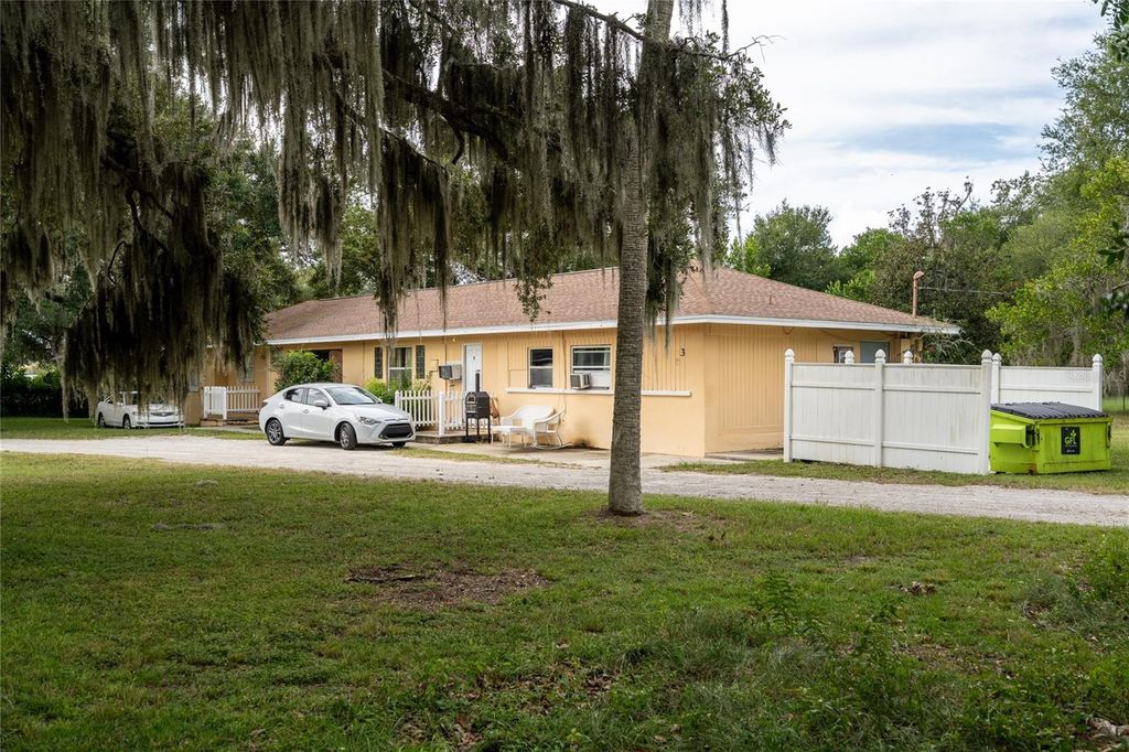 Photo of 124 S Charles Richard Beall Boulevard, Debary, FL 32713 (MLS # V4945101)