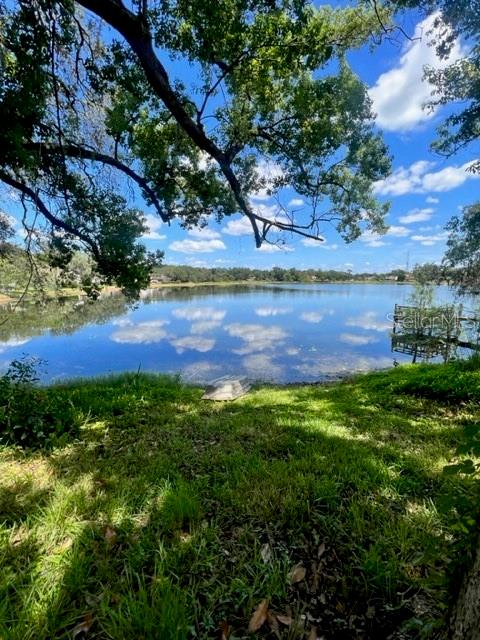 Lake Front Oasis in The Landings of Longwood!! Completely updated, 3/2 home Plus Den is nestled in a lovely, private gated community. Not a stitch of carpet! Open floor plan,? living area has double high ceilings, fireplace, and built?-in bookshelves?, wood look tile that is so easy to clean. ?Enjoy the stunning Lake Views from almost every window. The kitchen? and is fully renovated with ?h?igh-end stainless steel appliances, elegant herringbone cut marble backsplash?, ?custom lighting, ?a dinette area? , and a sliding door to the large patio. ?The primary suite is on the first floor and has a gorgeous ensuite bath with custom marble walk-in ?shower? with multiple shower heads with steam, built-in speakers, defrosting mirrors, dual sinks? , and dual closets. Step out of your private sliding door to enjoy the patio and lake view. ?The first level also has a half bath, laundry room with storage? , and a new washer/ dryer?, ?a den/ office? which could become a 4th bedroom, 2-car garage with extra storage. ?T?he second floor has two bedrooms with skylights and a ?beautifully updated bathroom. Entertain on the large back deck overlooking West Lake! Drop in your kayak, paddle board?, or a fishing line. Enjoy the community pool?, walk paths, and tennis court?s. Minutes to great shopping, restaurants, ?Longwood's Historic District, parks?, and springs. Short drive to Advent Health, Orlando Health, Altamonte Mall, Cranes Roost Park,? Wekiva Springs? , and Great Schools!? Easy access to 417 and I-4, 25 minutes to Orlando International Airport, Sanford Airport, Attractions, and Downtown Orlando!