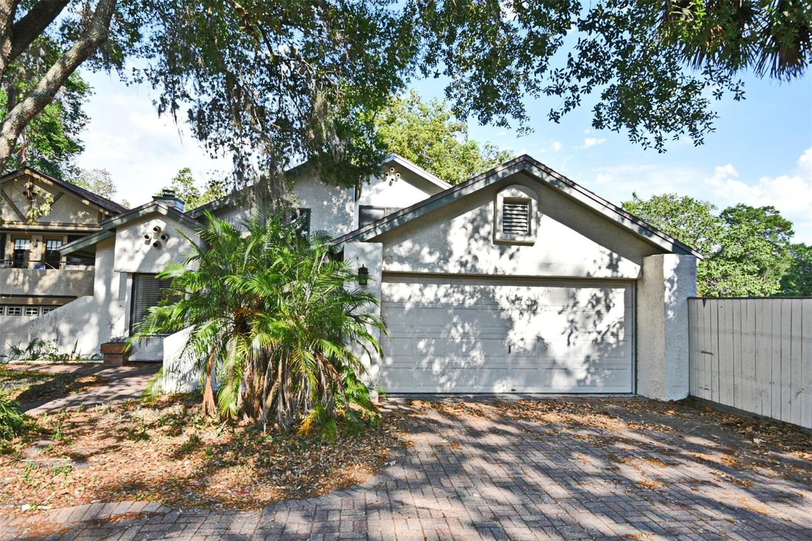 Lake Front Oasis in The Landings of Longwood!! Completely updated, 3/2 home Plus Den is nestled in a lovely, private gated community. Not a stitch of carpet! Open floor plan,? living area has double high ceilings, fireplace, and built?-in bookshelves?, wood look tile that is so easy to clean. ?Enjoy the stunning Lake Views from almost every window. The kitchen? and is fully renovated with ?h?igh-end stainless steel appliances, elegant herringbone cut marble backsplash?, ?custom lighting, ?a dinette area? , and a sliding door to the large patio. ?The primary suite is on the first floor and has a gorgeous ensuite bath with custom marble walk-in ?shower? with multiple shower heads with steam, built-in speakers, defrosting mirrors, dual sinks? , and dual closets. Step out of your private sliding door to enjoy the patio and lake view. ?The first level also has a half bath, laundry room with storage? , and a new washer/ dryer?, ?a den/ office? which could become a 4th bedroom, 2-car garage with extra storage. ?T?he second floor has two bedrooms with skylights and a ?beautifully updated bathroom. Entertain on the large back deck overlooking West Lake! Drop in your kayak, paddle board?, or a fishing line. Enjoy the community pool?, walk paths, and tennis court?s. Minutes to great shopping, restaurants, ?Longwood's Historic District, parks?, and springs. Short drive to Advent Health, Orlando Health, Altamonte Mall, Cranes Roost Park,? Wekiva Springs? , and Great Schools!? Easy access to 417 and I-4, 25 minutes to Orlando International Airport, Sanford Airport, Attractions, and Downtown Orlando!