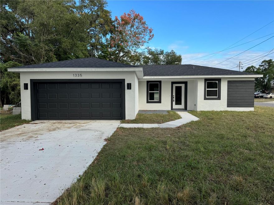 New construction contemporary 3-bed, 2-bath home with 1,250 sq ft living space. Featuring stainless steel appliances, white cabinets, and the convenience of city water and sewer. Enjoy the added allure of a corner location. The spacious open floor plan allows ample space for entertaining with an open-concept Kitchen/Great room. Buy with confidence, as this solid new construction home also comes with the Builder's 2-10 Warranty, providing a comprehensive 2-Year Warranty on the home's mechanical systems along with a 10-Year Structural Warranty on the foundation