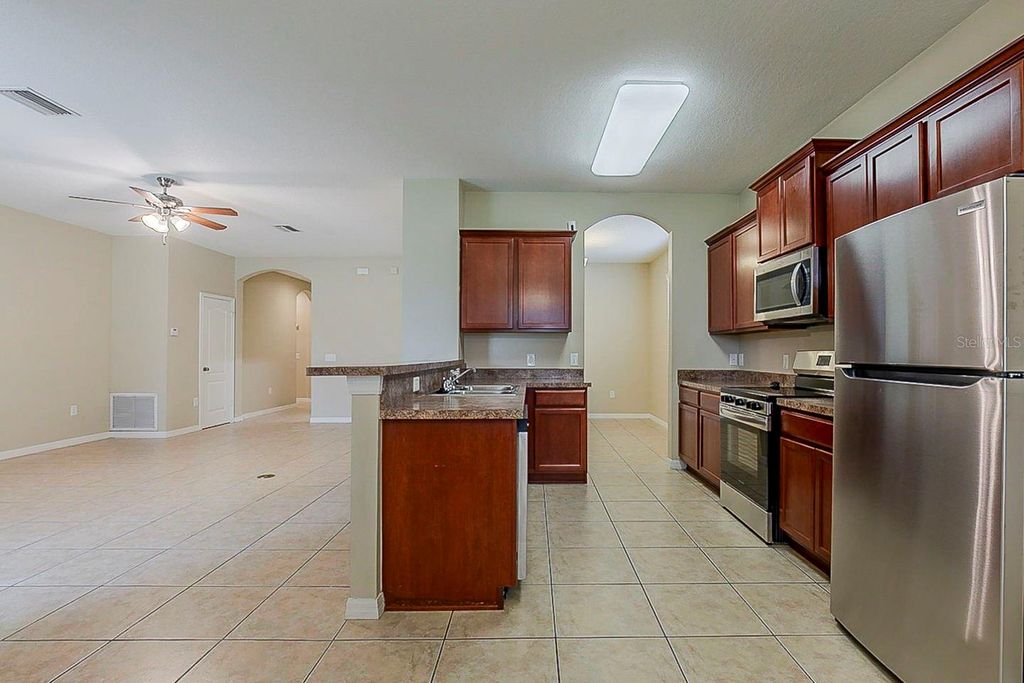 Photo of 4145 Constantine Loop, Wesley Chapel, FL 33543 (MLS # O6343705)