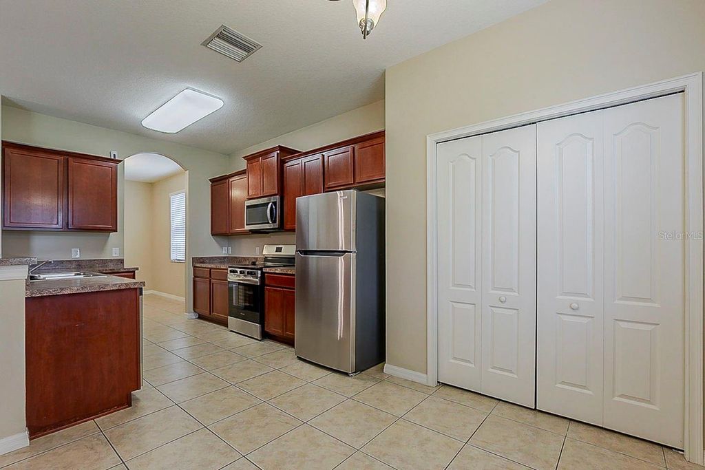 Photo of 4145 Constantine Loop, Wesley Chapel, FL 33543 (MLS # O6343705)