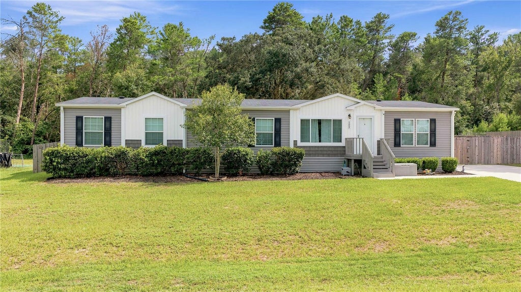 Photo of 122 SE 70th Circle, Ocala, FL 34472 (MLS # OM728889)