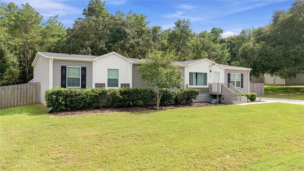 Photo of 122 SE 70th Circle, Ocala, FL 34472 (MLS # OM728889)