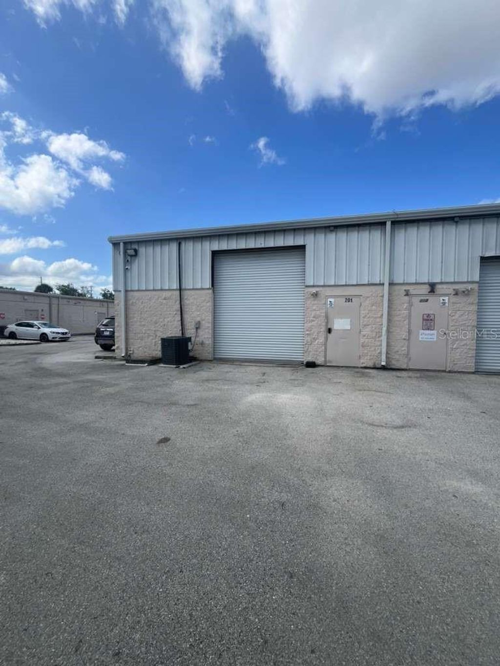 Photo of 11609 S Orange Blossom Trail #201, Orlando, FL 32837 (MLS # G5111657)