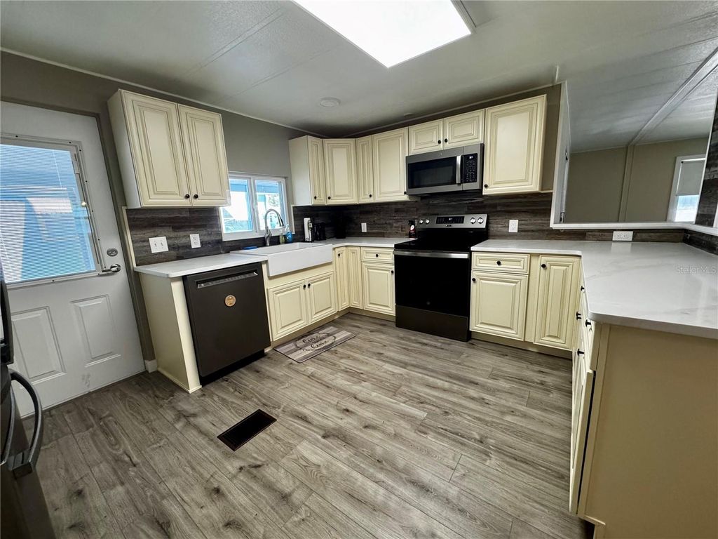 Photo of 5619 Bayshore Road #120, Palmetto, FL 34221 (MLS # A4690872)