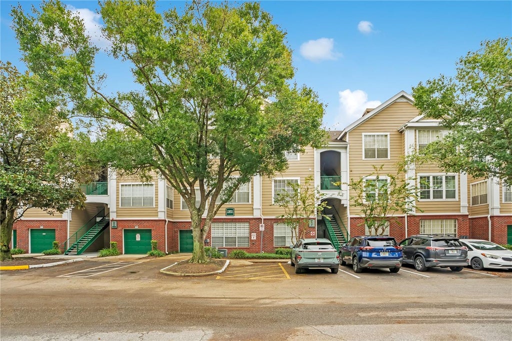 Photo of 13015 Plantation Park Circle #1023, Orlando, FL 32821 (MLS # O6451131)
