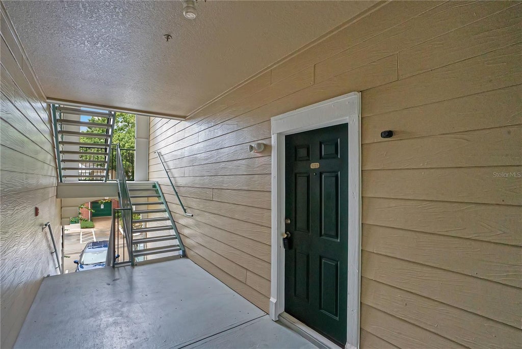 Photo of 13015 Plantation Park Circle #1023, Orlando, FL 32821 (MLS # O6451131)