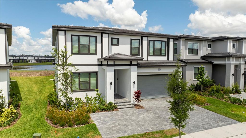 Photo of 10018 Voyager Way, Orlando, FL 32821 (MLS # O6390488)