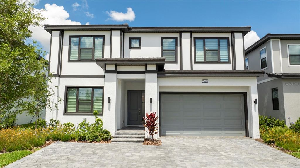 Photo of 10018 Voyager Way, Orlando, FL 32821 (MLS # O6390488)