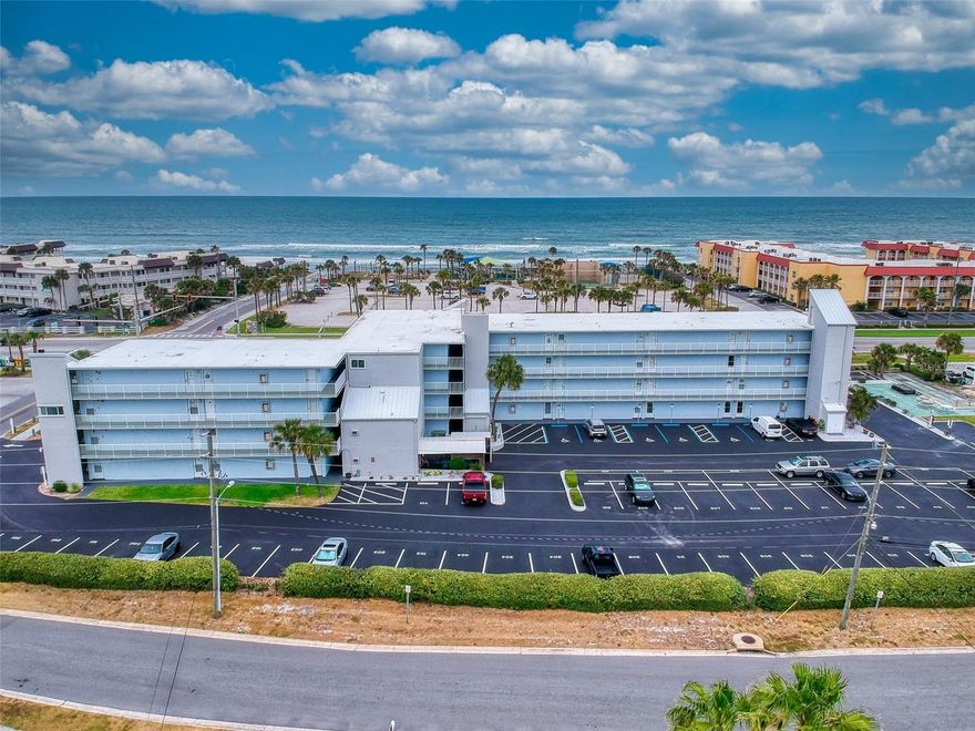 One or more photo(s) has been virtually staged. Enjoy coastal living at its finest in this beautifully updated 1-bedroom, 1-bath condo with pool &  ocean views from the balcony. Completely remodeled in 2021 for full-time living, this unit combines modern design with thoughtful, high-quality upgrades throughout.
The kitchen is a standout feature, showcasing elegant granite countertops, crisp white shaker cabinets, solid rosewood shelving, and a built-in peninsula island accented by stylish pendant lighting—perfect for both everyday living and entertaining. Brand-new kitchen appliances installed in 2026 add both convenience and peace of mind.
Sleek 24” x 24” marble terrazzo tile flows seamlessly throughout the entire unit, creating a clean and sophisticated look. The bathroom features a spacious walk-in shower with a sliding glass door, along with a designer barn door that separates the bathroom and laundry area for added functionality and style.
Additional upgrades include a hurricane-rated sliding glass door (2021), split A/C unit (2021), hot water heater (2021), and a ventless washer/dryer tower (2025). Ample custom storage solutions have been thoughtfully integrated throughout the home, maximizing space and organization.
Whether you're looking for a full-time residence, vacation getaway, or investment opportunity, this turnkey condo offers comfort, durability, and breathtaking views—all in one.
Mariners Cove Condo itself has had a recent complete makeover including a new roof, paint, balconies, walkways and pool area with fresh new pavers. This is the perfect complex offering easy beach access, shopping and several nearby restaurants. Short term rentals are also allowed.