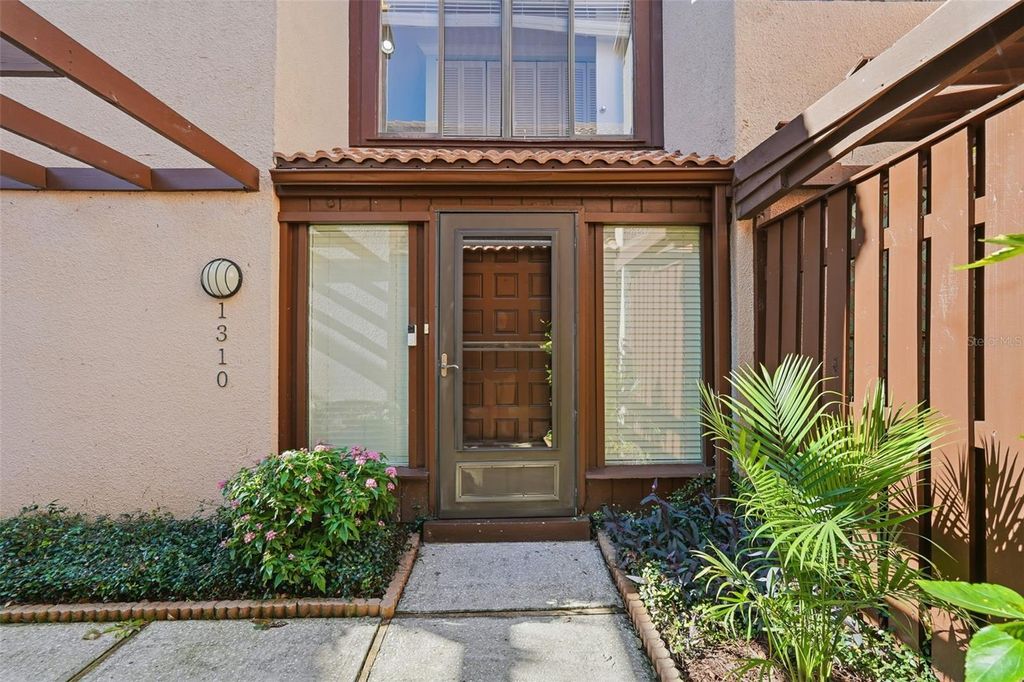 Photo of 1310 Pelican Creek Crossing, St Petersburg, FL 33707 (MLS # TB8469101)