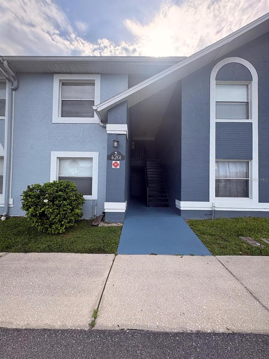 Photo of 4261 Pershing Pointe Place #5, Orlando, FL 32822 (MLS # R4911886)