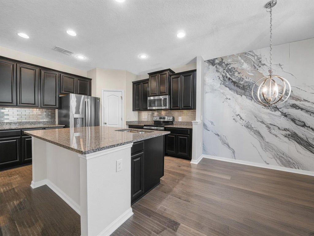 Photo of 184 Whirlaway Drive, Davenport, FL 33837 (MLS # TB8530509)