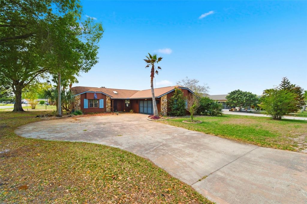 Photo of 8390 Dunnellon Road, Weeki Wachee, FL 34613 (MLS # TB8492066)