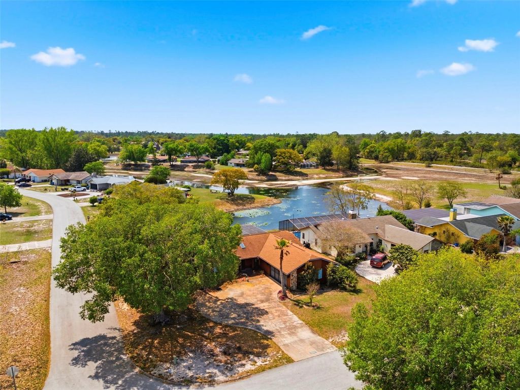 Photo of 8390 Dunnellon Road, Weeki Wachee, FL 34613 (MLS # TB8492066)