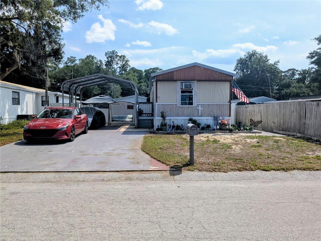 Photo of 53 Sunset Circle, Lake Alfred, FL 33850 (MLS # S5148632)