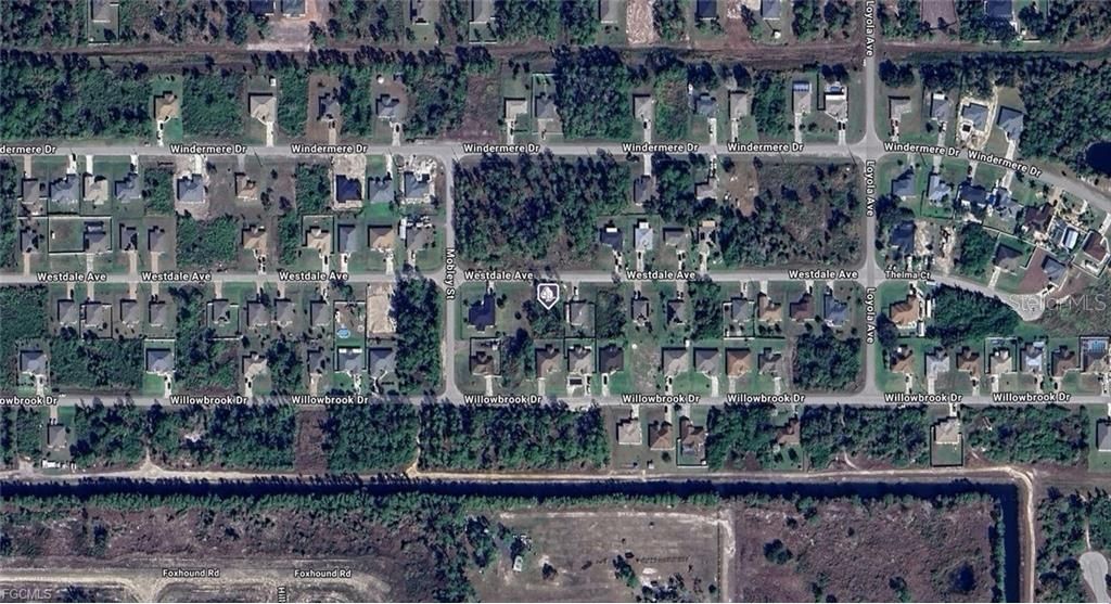 Photo of 467 Westdale Avenue, Lehigh Acres, FL 33972 (MLS # A4662712)