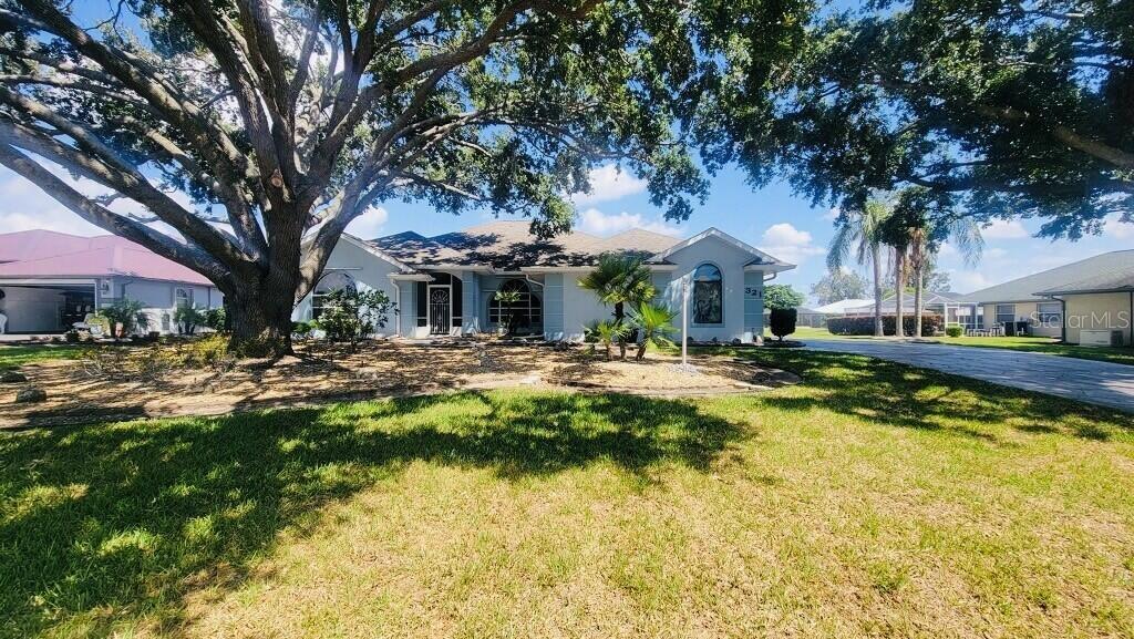 This charming home at 321 Duane Palmer Blvd in Sebring, FL has a serene retreat surrounded by nature. Featuring a spacious layout, the property includes multiple bedrooms and bathrooms, appropriate for comfortable living. The well-appointed kitchen is very spacious, while the living areas are filled with natural light. Enjoy outdoor activities in the backyard, which borders a golf course. Conveniently located near local amenities, this home provides a superb blend of comfort and accessibility, with many parks and recreational activities.