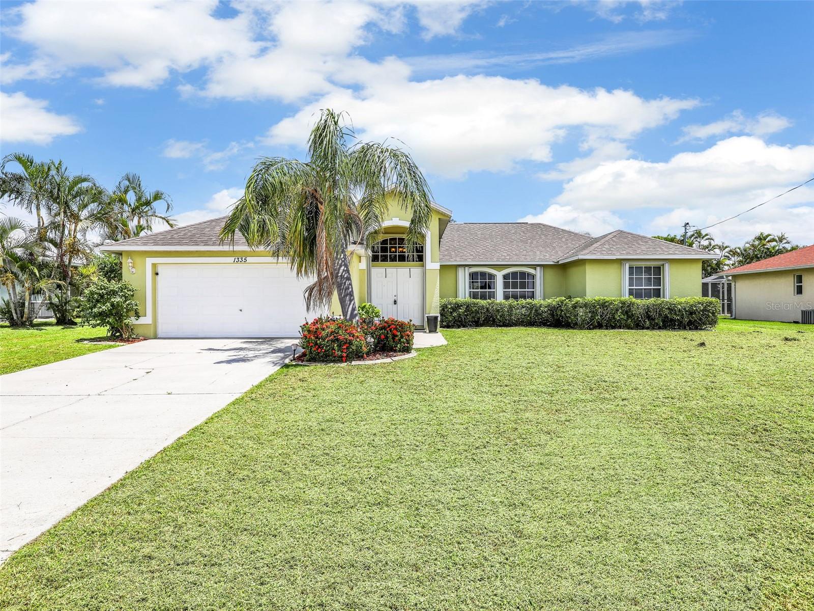 Welcome to your Florida dream home! This stunning 3-bedroom, 2-bath ranch is located in the heart of Cape Coral and designed for both comfort and entertaining. The open-concept layout features a formal dining room wrapped in 180-degree windows, offering panoramic views of the sparkling in-ground pool and private backyard oasis. A split-bedroom floor plan provides privacy, while tasteful finishes and thoughtful details make this home truly move-in ready. Ideally situated near upscale shopping, dining, and coastal attractions—enjoy Florida living at its best.