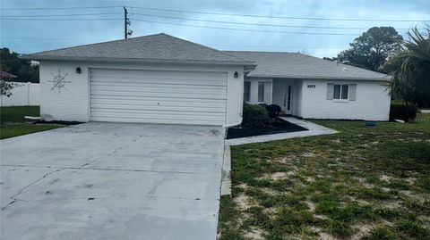 Photo of 1077 Willow Wood Drive, Port Orange, FL 32129 (MLS # NS1084745)