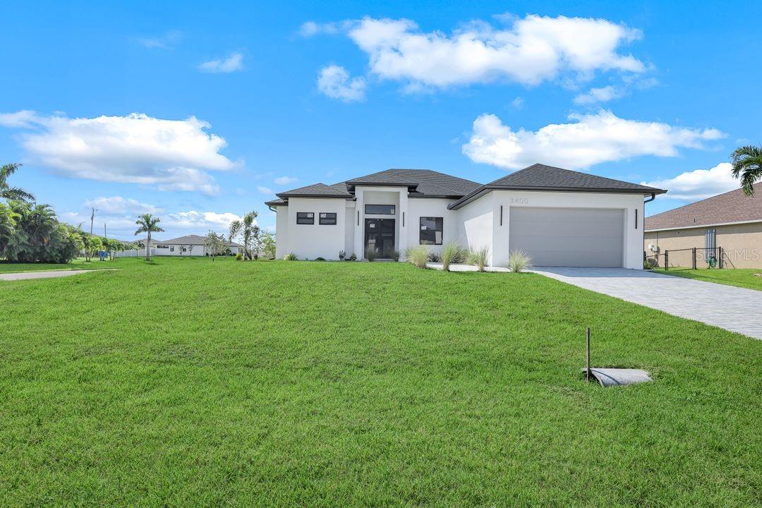 Welcome to your dream long-term rental in Southwest Florida! This brand-new home in Northwest Cape, CapeCoral, west of Burnt Store Road, isa true gem. Located in an area surrounded by picturesque canals and near golfcourses and entertainment, it offers tranquility and convenience.The interior features 10" & 11" high tray ceilings,a spacious 2,135 sq. ft. open floor plan, 3 BD, a DEN, 3 BAs, and a 2-car garage. The gourmetkitchen has awaterfall quartz island, solid wood cabinets, & stainless-steel smart appliances. Enjoy the independent laundryroom, ample closetspace, & marble-like tile flooring. Relax under the covered lanai or swim in the large screenedpool. Hurricane impact windows and doors offerpeace of mind. Experience the Florida lifestyle in this stunningrental property!