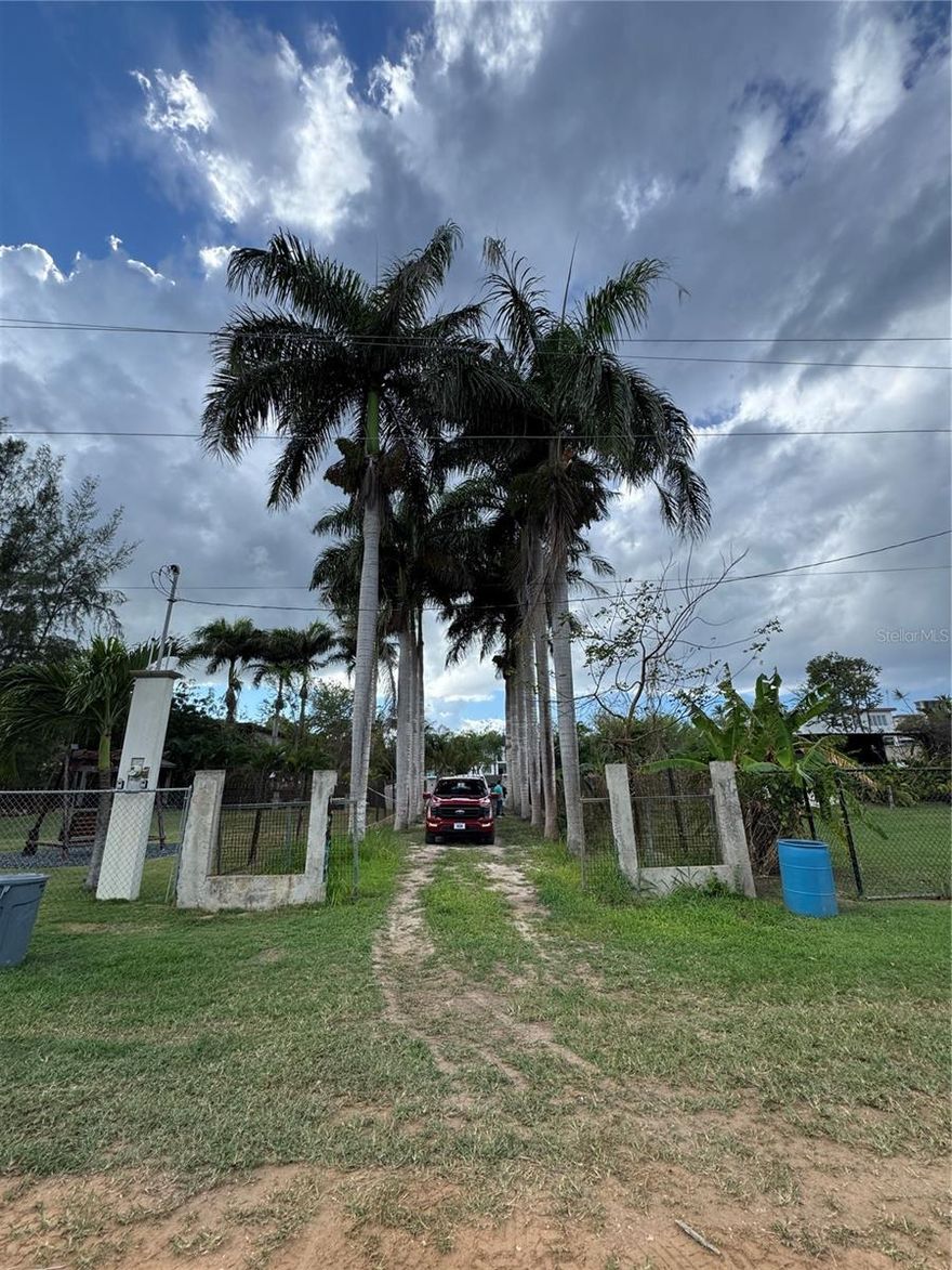 Prime Development Opportunity: 4-Unit Compound on 2,473 SqM Lot Steps from Jobos BeachProperty
Rare opportunity to acquire a massive 2,473.27 square meter lot (approx. 0.63 cuerdas) in the highly sought-after Bajuras neighborhood of Isabela. Located at 3 minute walking to the world-famous Jobos Beach, this property offers an exceptional canvas for developers and investors looking to capitalize on Puerto Rico's thriving short-term rental market.
THE PROPERTY:The existing structure is a multi-family compound consisting of four (4) independent units, each featuring 1 bedroom and 1 bathroom. The property includes a concrete swimming pool and ample green space.
CONDITION & POTENTIAL:Selling "As-Is." The property is a fixer-upper requiring full rehabilitation. The main structure is mixed construction (concrete with wood/zinc roofing). The true value lies in the expansive, flat lot—a scarcity in this area—which offers privacy and room for significant expansion, segregation, or the development of luxury amenities (gazebos, yoga decks, parking).

Isabela is the surf capital of the Caribbean. This property is perfectly positioned to capture high occupancy rates year-round, offering guests walking access to beaches, restaurants, and nightlife while maintaining the seclusion of a private estate.

HIGHLIGHTS:Lot Size: 2,473.27 m2 (0.62 Acres) Units: 4 (1 Bed / 1 Bath each)Amenities: Private Pool (Needs repair)Zoning: Location: Walking distance to Jobos Beach. Don't miss this chance to build a boutique hotel or vacation complex in one of Puerto Rico's hottest markets. Contact us today to schedule a private showing.
