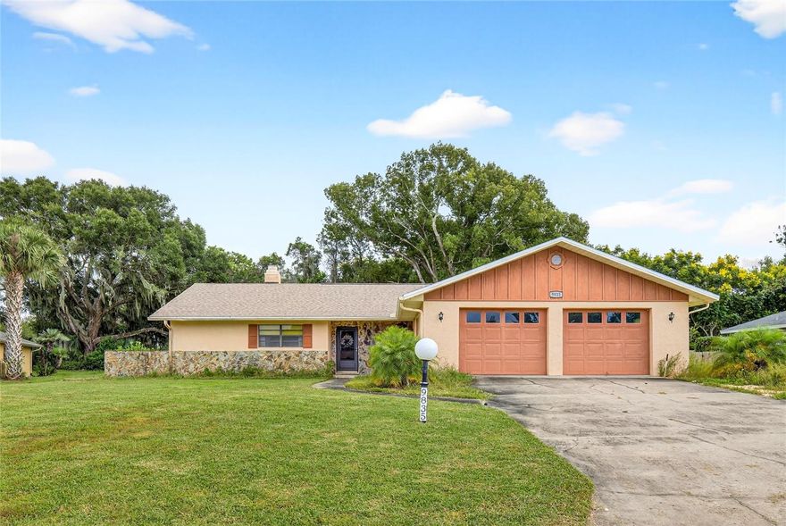 WELCOME TO YOUR QUIET FLORIDA RETREAT NEAR SILVER LAKE! This charming home offers the perfect blend of comfort, convenience, and space — just an hour from all the excitement of Orlando, yet tucked away in a peaceful, well-established neighborhood. Sitting on a SPACIOUS 0.39-ACRE LOT, this property provides plenty of room to relax, garden, or simply enjoy the outdoors. Inside, you’ll find an open-concept layout designed for easy living and entertaining. As you enter into the tiled foyer, you are met with the split-bedroom floor plan that ensures privacy for everyone, while the large living room opens seamlessly to a screened-in patio, perfect for morning coffee or evening gatherings. Practical upgrades give you peace of mind for years to come, including a new 2023 roof, new HVAC system, and a 2019 water heater. The oversized two-car garage offers room to spare, and there’s also a dedicated exterior storage area large enough for your golf cart or outdoor equipment. Whether you’re looking for a year-round residence, seasonal getaway, or investment opportunity, this home delivers the best of both worlds — a quiet, spacious lifestyle with easy access to shopping, dining, and all that Central Florida has to provide. Come see why this Leesburg gem is the perfect place to call home!