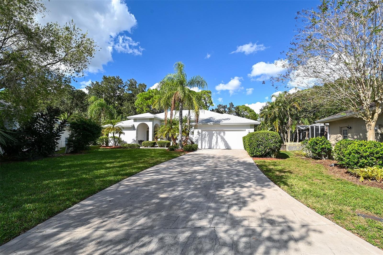 Lovely turnkey furnished single family home in the Meadows is available to rent. MEADOWS, Sarasota FL 34235. The large home, overlooking the golf course, has three bedrooms, two bathrooms, split bedrooms, and a living room/dining room combination. The kitchen has stainless appliances and a breakfast nook. The primary bedroom has a queen sized bed, two big closets and an en suite bathroom with double sinks, garden tub, stall shower and a linen closet. The first guest bedroom has two twin beds and the second guest bedroom is set up as an office with a pull out sofa bed. The guest bathroom has a tub/shower combination. The home has a caged lanai with heated pool, several sitting areas and lush landscape view of a golf course. The home has sliding glass doors, a laundry room, two car garage and is located on a very quiet cul-de-sac. Available for an annual rental or short term booking. Long term rental rate is $2,900 monthly. Short term, one month or longer, rate is $6,500 (December through April) or $3,000 (May through November) plus state/local tax, $226 booking fee and damage deposit. Located in the Meadows which is home to the Meadows Country Club that offers seasonal, social and full memberships, three golf courses, club house and tennis courts (home does not come with a country club membership but guest/tenant may sign up for one themselves.) Close to Nathan Benderson Park, University Town Center, Sarasota/Bradenton Airport, I75 highway, University Parkway, shopping, grocery stores, coffee shops and much much more.