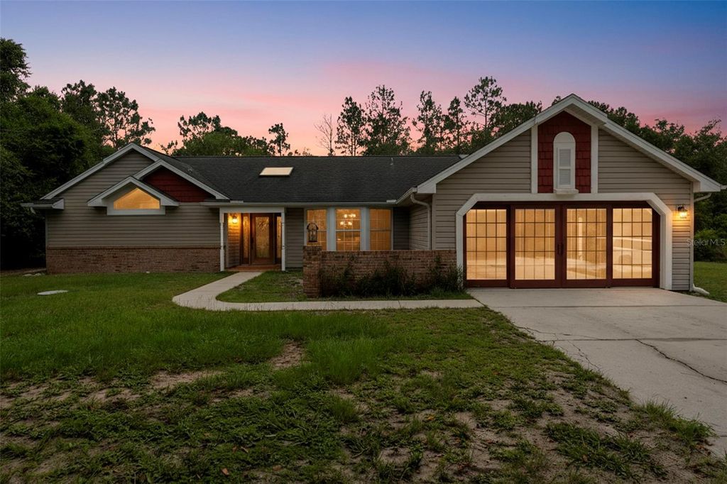 Photo of 17155 Dalberg Drive, Spring Hill, FL 34610 (MLS # TB8411439)