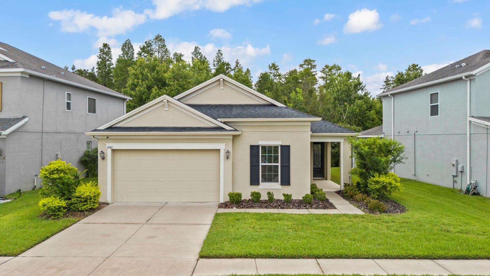 Welcome to this beautiful 4-bedroom, 2-bathroom single-family home offering the perfect blend of comfort and privacy—all on one convenient level. The open-concept layout features a spacious living and dining area that flows seamlessly into the large eat-in kitchen, complete with stone countertops, ample cabinetry, and plenty of space for gatherings.
The expansive primary suite boasts a generous walk-in closet and a luxurious en suite bathroom with dual vanities, a soaking tub, and a separate shower. All bedrooms feature brand-new carpet, providing a fresh and inviting feel throughout.
Step outside to the oversized screened-in back patio, perfect for relaxing or entertaining, with peaceful views of the nature preserve—no rear neighbors for ultimate privacy. Located in a quiet, well-maintained neighborhood with excellent amenities, this home offers the ideal combination of tranquility and convenience, close to shopping, dining, and more.