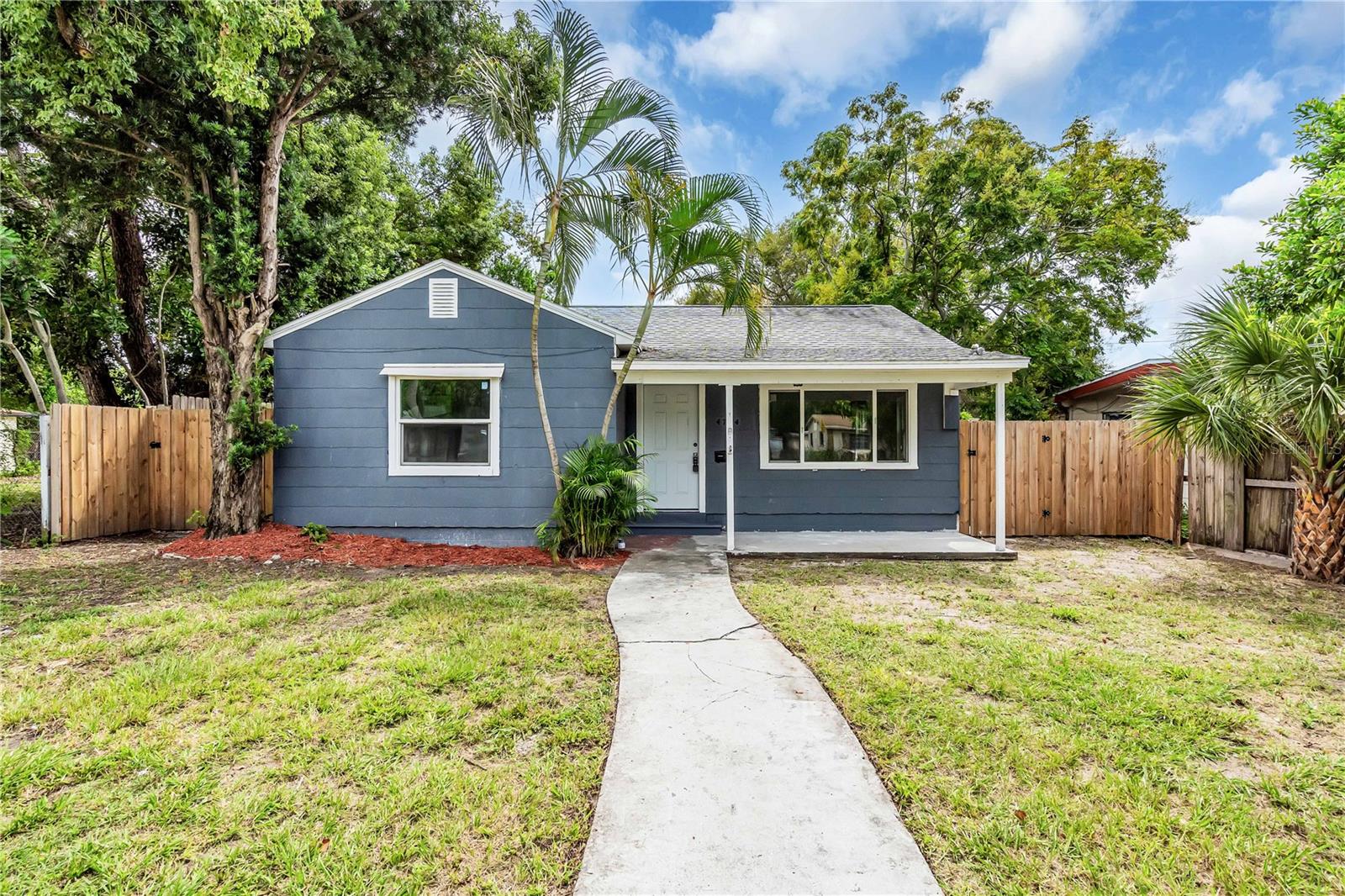 Welcome to this charming must-see single family home with 3-Bedroom, 1-bathroom and a 2 car garage home in St. Pete, FL. This beautifully updated home features a newly painted exterior and interior, large fenced in backyard. Step inside this home to find a bright, freshly painted interior wall that offers new lighting, vinyl plank flooring, and ceramic tile in the bathroom. Enjoy cooking in your beautiful kitchen that boasts new white cabinets, granite countertops, stainless steel appliances including a brand new dishwasher. The bathroom has also been updated with modern lightings, tile walls and standard technology showers. This property is close to downtown St. Pete, highways and shopping. This home not a a flood zone. The back of the garage of this home needs a little handy-man job, and current owner even have permit for the new renovations. The property is Sold As-Is in its current current condition. Don't miss this opportunity to make it your own dream home.