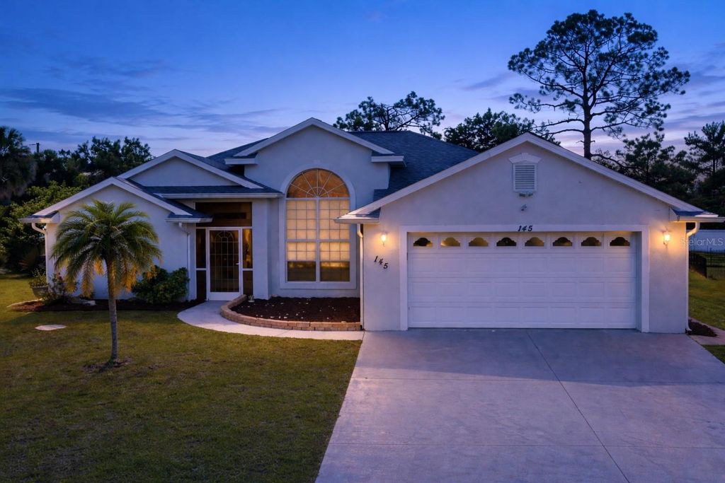 Photo of 145 Spur Drive, Rotonda West, FL 33947 (MLS # D6146696)