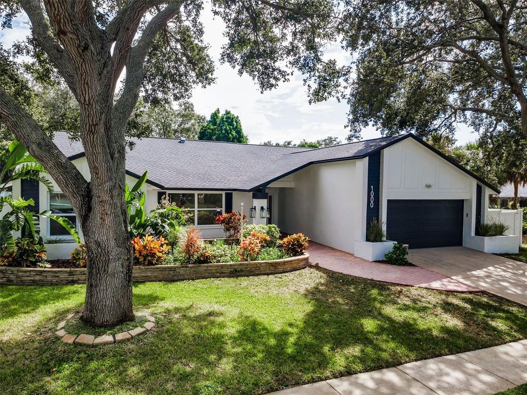 Photo of 1000 Wexford Leas Boulevard, Palm Harbor, FL 34683 (MLS # TB8434602)